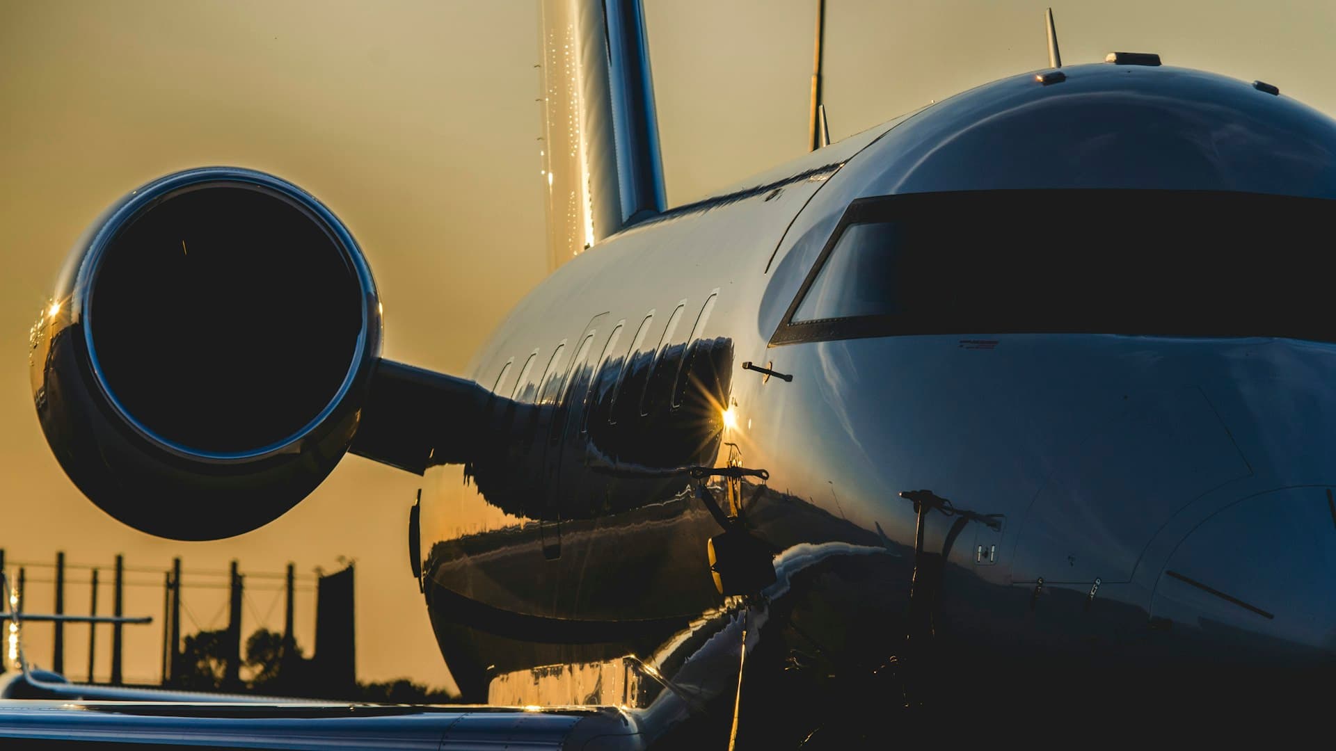 Business jet engine at golden hour